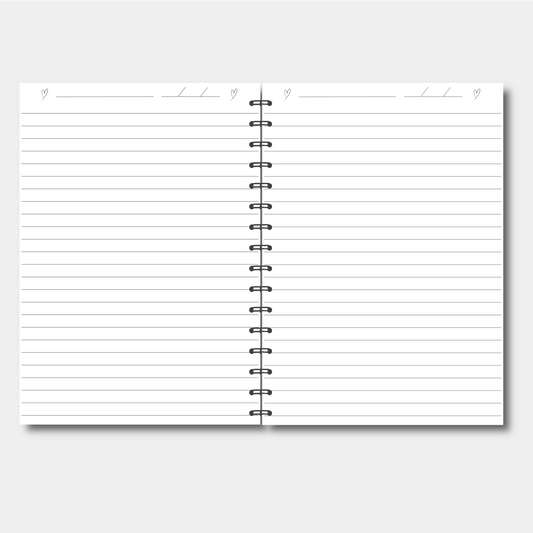 Spiral-bound notebook with lined pages on a light gray background