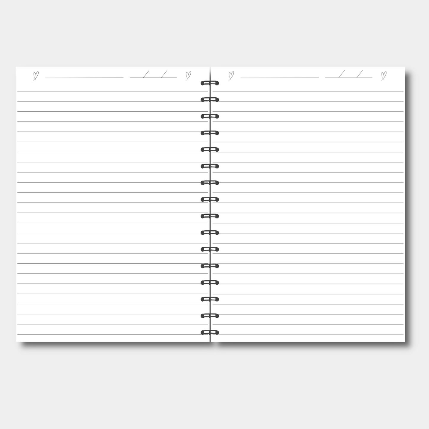 Spiral-bound notebook with lined pages on a light gray background
