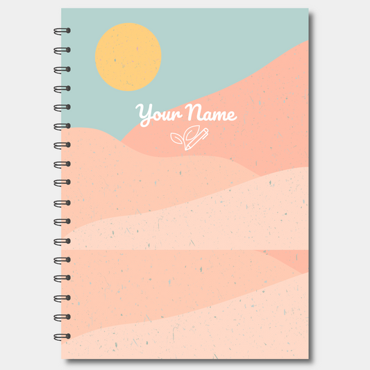 Notebook with a colorful design of a sun and mountains on the cover, with 'Your Name' text.