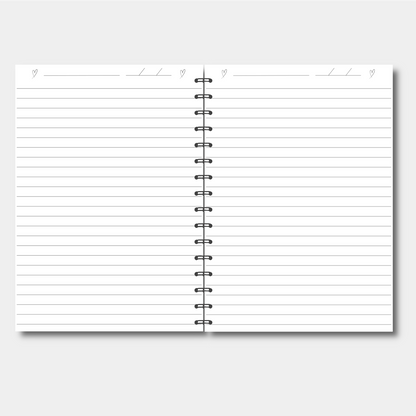 Spiral-bound notebook with lined pages on a light gray background