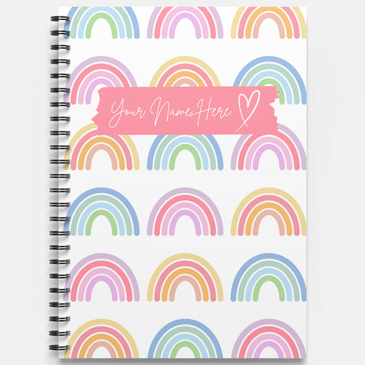 Notebook with rainbow pattern and customizable name banner on cover